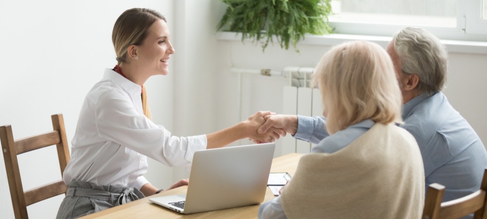 female-lawyer-with-older-couple